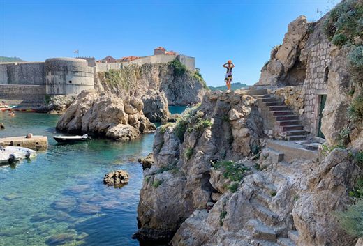 Dubrovnik city walls seen from the cliffs near Buža